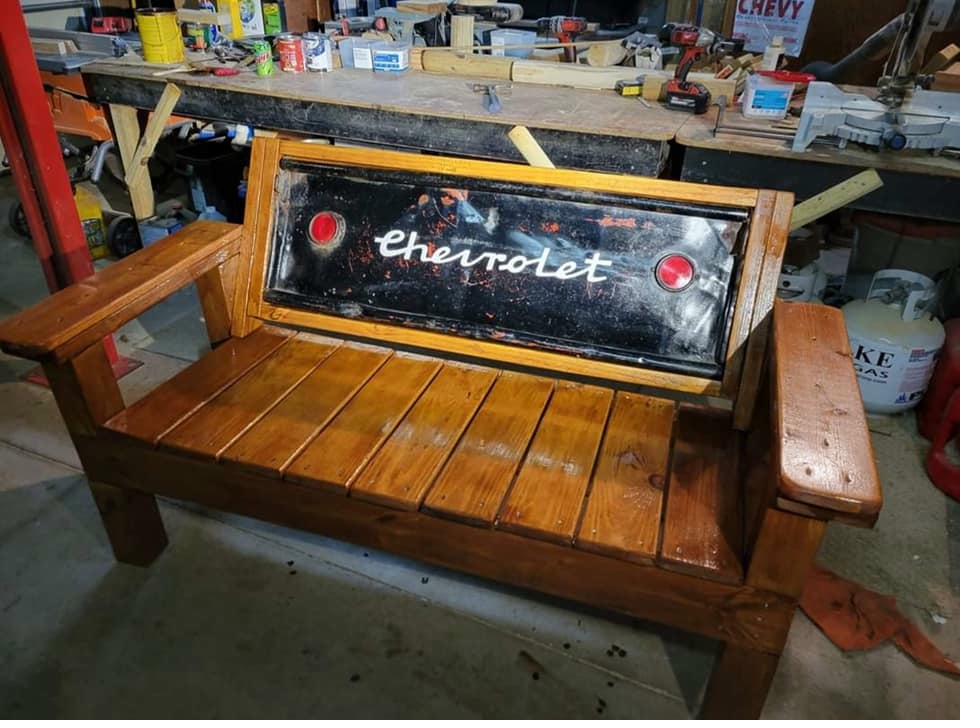 Custom wooden bench built with a vintage Chevrolet tailgate backrest