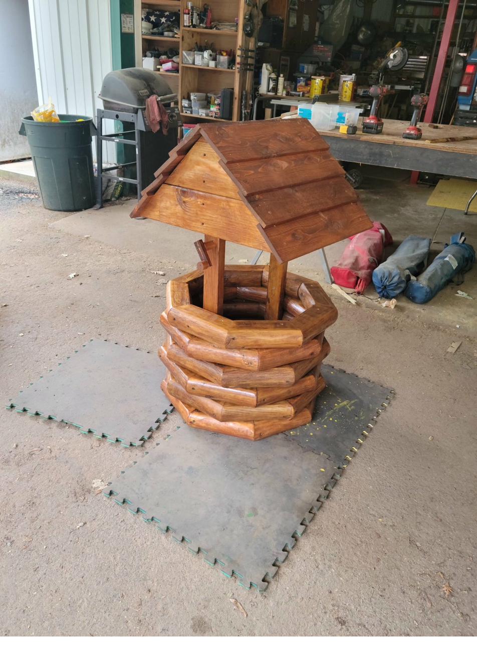 Natural stained decorative wishing well, log-cabin style