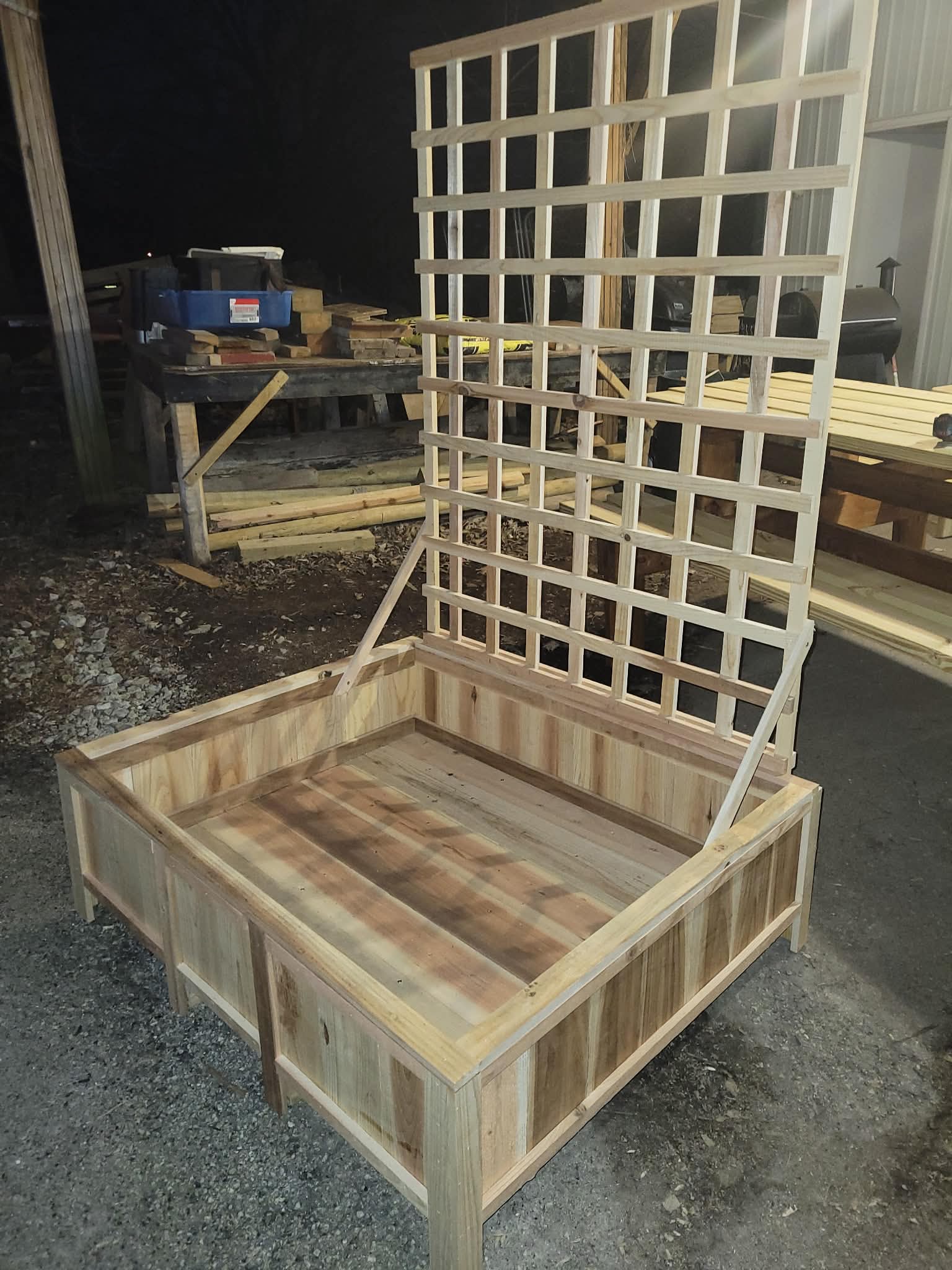 Cedar planter box with full-height grid trellis panel